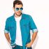 Portrait of handsome smiling stylish hipster lumbersexual businessman model wearing jeans clothes and sunglasses. Fashion man isolated on white